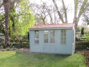 2.4 x 3.6m Holkham Summerhouse painted in Exterior Lizard with Cedar Shingles on the Roof and Georgian Windows