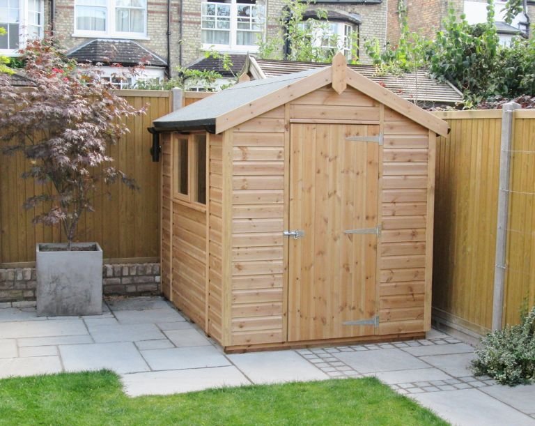 an attractive and compact garden shed with an apex roof covered with heavy-duty, heat-bonded felt. 