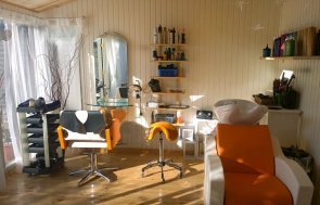 4.8 x 4.8m-Burnham Studio turned Hair Salon Painted in Exterior Ivory with Two Internal Partitions and Velux Window