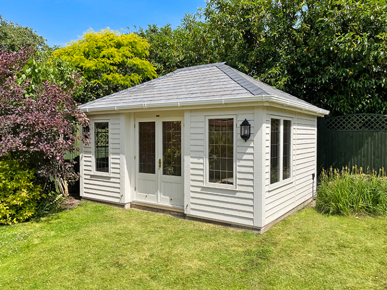 3.6 x 4.8m Garden Room Painted in Farrow and Ball Pointing with a Hipped Roof and Inset Doors