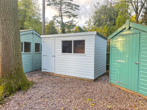 Trentham's 1.8 x 3.0m Classic Shed Painted in Smoke with a Pent Roof