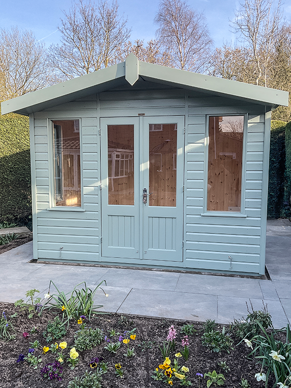 3.0 x 2.4m Blakeney Summerhouse Painted in Sage with a Roof Overhang