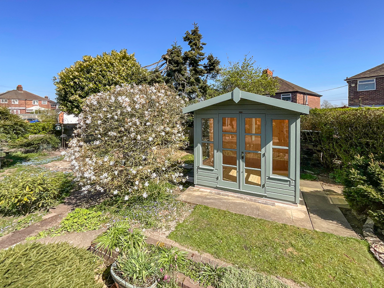 2.4 x 2.4m Blakeney Summerhouse painted in Sage with Apex Roof