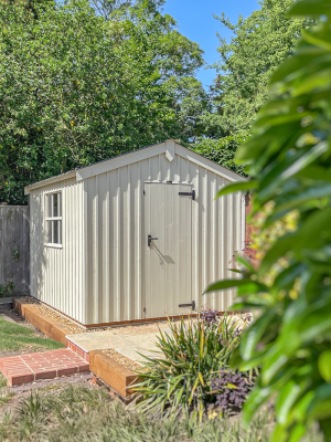 2.4 x 3.0m Peckover National Trust Shed painted in Dome Ochre with Apex Roof