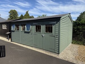 3.6 x 5.4m Superior Shed painted in Green Smoke with Apex Roof at Newbury