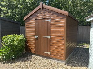 2.4 x 3.0m Superior Shed painted in Walnut with Apex Roof at Cranleigh