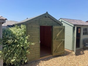 2.4 x 3.0m Superior Shed painted in Green with Apex Roof at Brighton