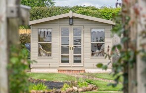 3.6 x 3.0m Blakeney Summerhouse painted in Taupe with Apex Roof